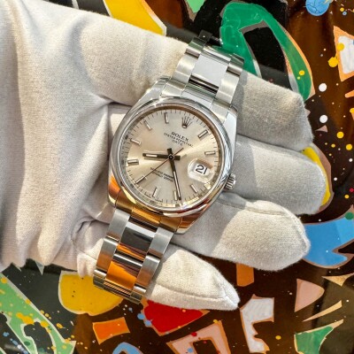 Montre Rolex Date 34 115200.