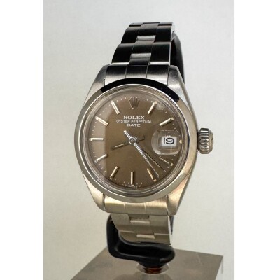 Montre Rolex Lady Date 26 6916.