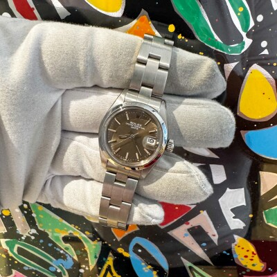 Montre Rolex Lady Date 26 6916.