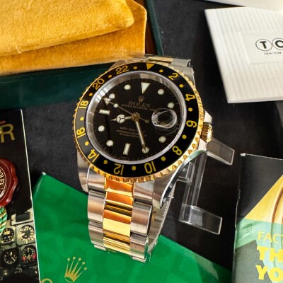 Montre Rolex GMT MASTER II 16713.