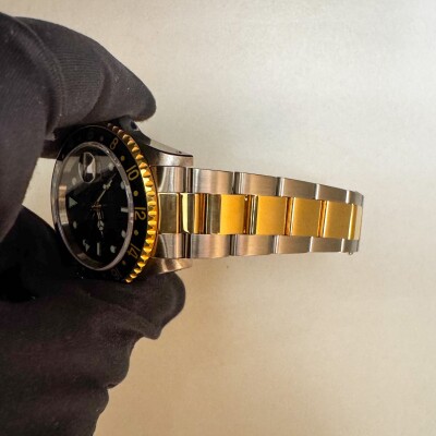 Montre Rolex GMT MASTER II 16713.