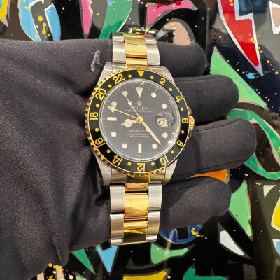 Montre Rolex GMT MASTER II 16713.