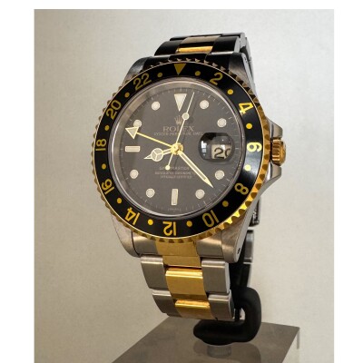 Montre Rolex GMT MASTER II 16713.