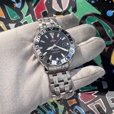 Montre Omega Seamaster 300m GMT 50Th Anniversaire.