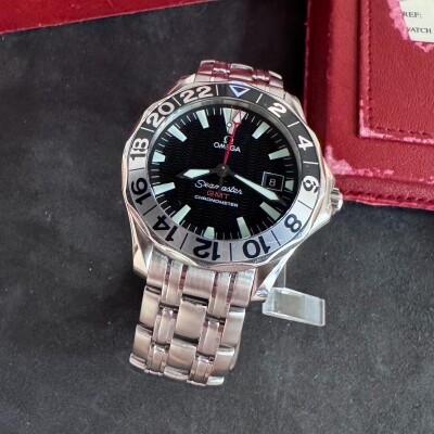 Montre Omega Seamaster 300m GMT 50Th Anniversaire.