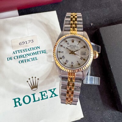 Montre Rolex Lady Date Or/acier 69173.