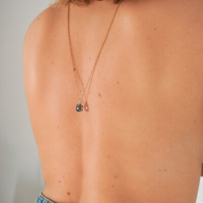 Collier Pomellato Nudo en or rose, or blanc, topaze bleu London et diamants