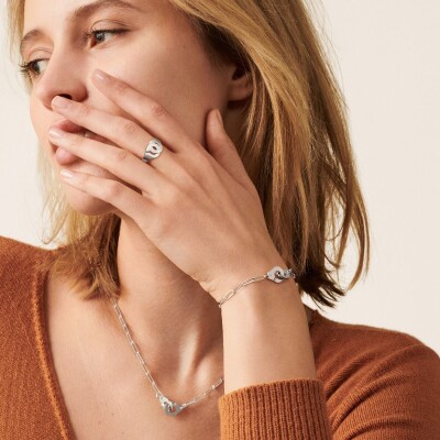 Bague Menottes dinh van en or blanc