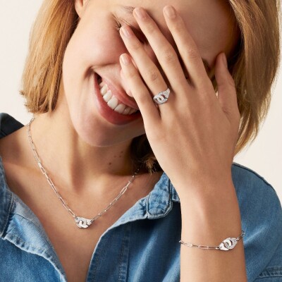 Bague Menottes dinh van en or blanc et diamants