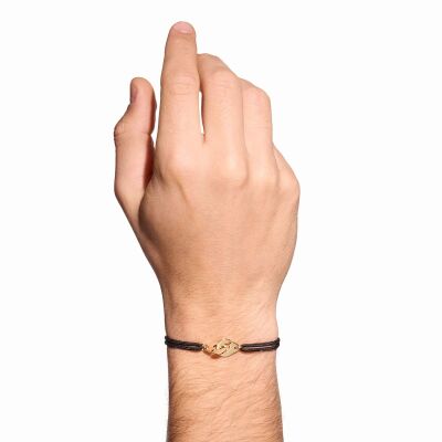 Bracelet sur cordon Menottes dinh van R10 en or jaune