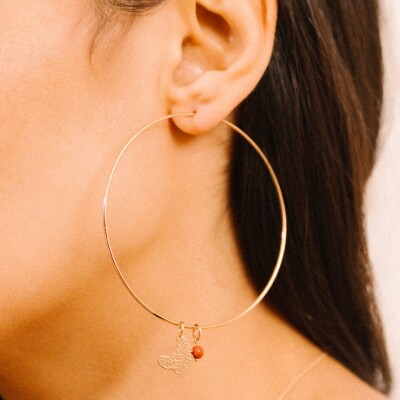 Pendentif Ginette NY CHARMS en or rose et pierre rouge