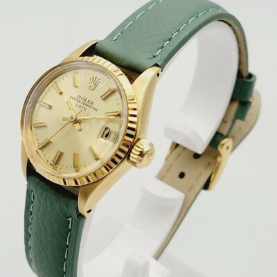 Montre Rolex Lady Date 6517 24mm boitier Or