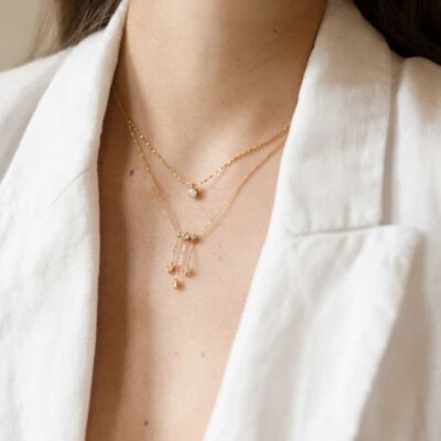 Collier Zag en acier doré et zircon