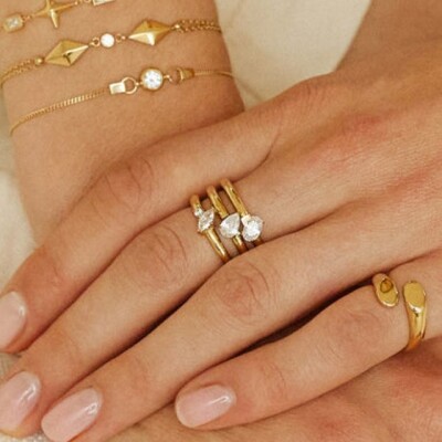 BAGUE Sibari ACIER DORE zirconium T56