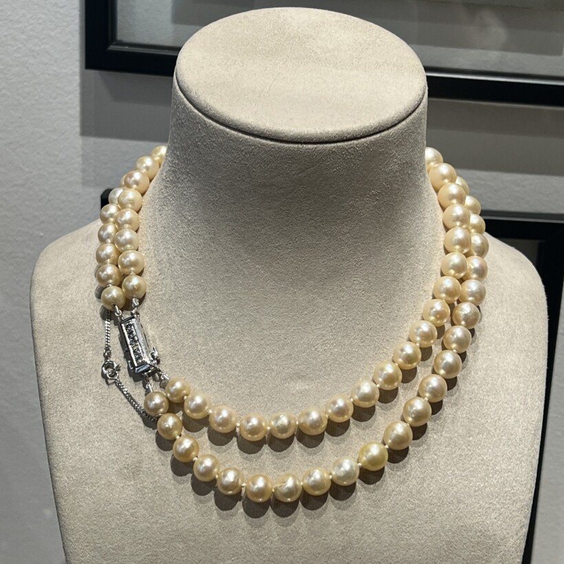 Collier double rangs de perles de culture, fermoir en or blanc et diamants