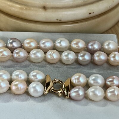Collier 2 rangs en perles d’eau douce. Fermoir en or jaune