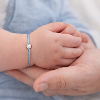 Bracelet SOLO SHINE or blanc sur cordon bleu turquoise