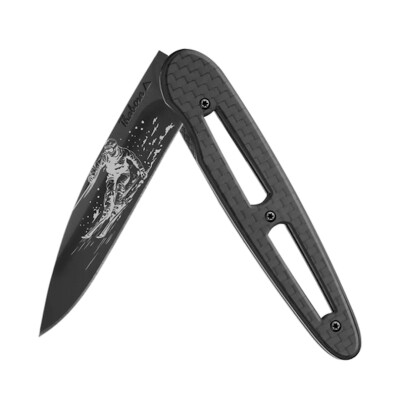 Couteau acier finition titane noir plaquette ajourée carbone motif «skieur»