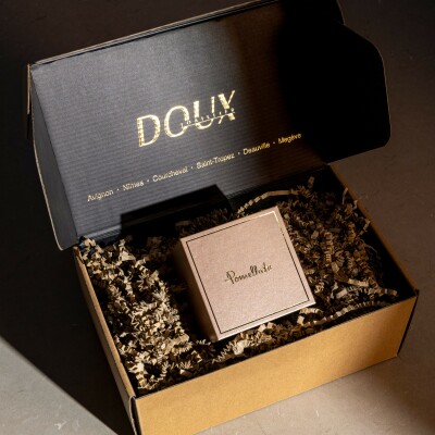 Boucles d'oreilles Pomellato Nudo en or rose, or blanc et topaze bleue