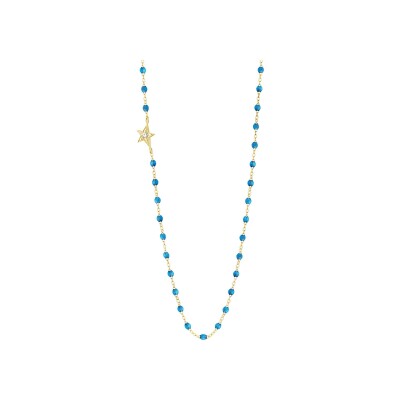 Collier Gigi Clozeau Etoile en or jaune, résine azur et diamants, taille 42cm