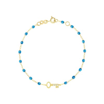 Bracelet Gigi Clozeau Clé en or jaune, résine azur et diamants, taille 17cm