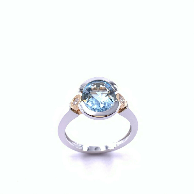 Bague en or blanc, or rose, topaze bleue et diamants