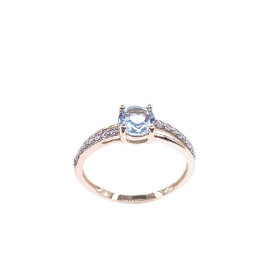 Bague en or jaune, topaze bleue traitée et oxyde de zirconium