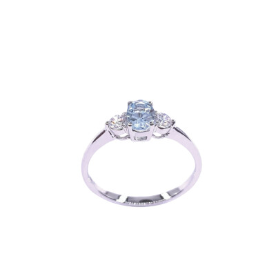 Bague en or blanc, topaze bleue traitée et oxyde de zirconium