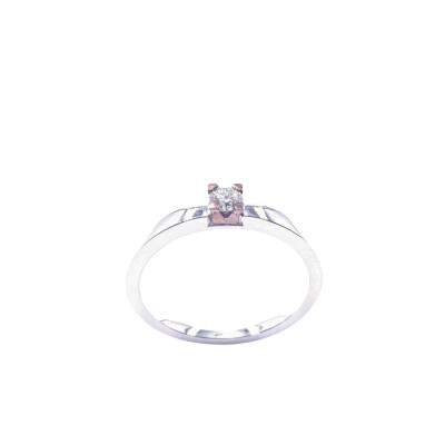 Solitaire en or blanc, or rose et diamants