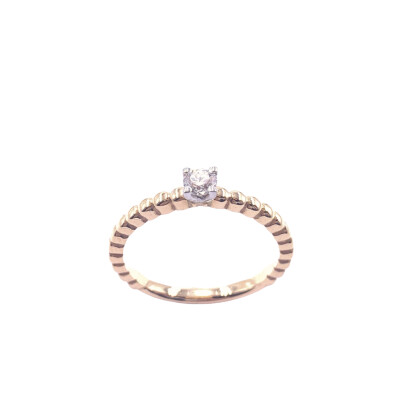 Solitaire en or rose et diamant