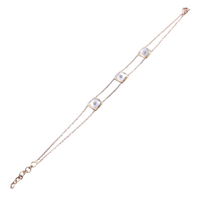 Bracelet en or rose, diamants et résine nacrée blanche