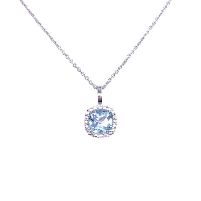 Pendentif en or blanc, et topaze bleue traitée