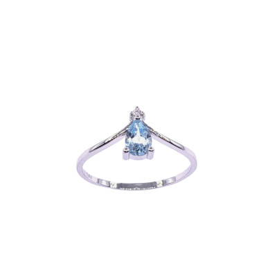 Bague en or blanc, topaze bleue traitée, diamant