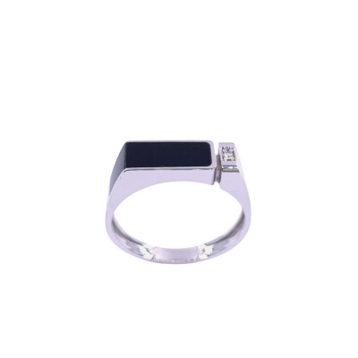 Bague en or blanc, diamant et résine noire
