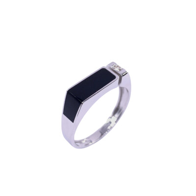 Bague en or blanc, diamant et résine noire