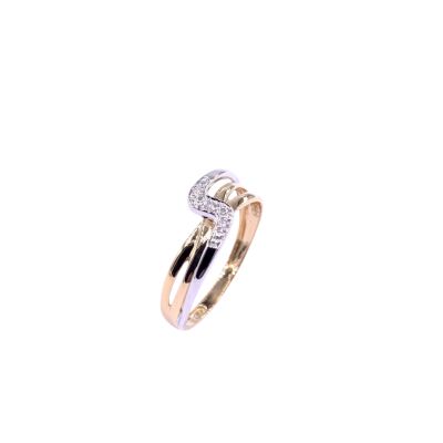 Bague en or jaune, bicolore et diamant