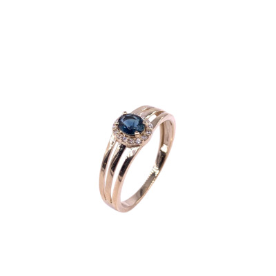 Bague en or jaune, saphir et oxydes de zirconium