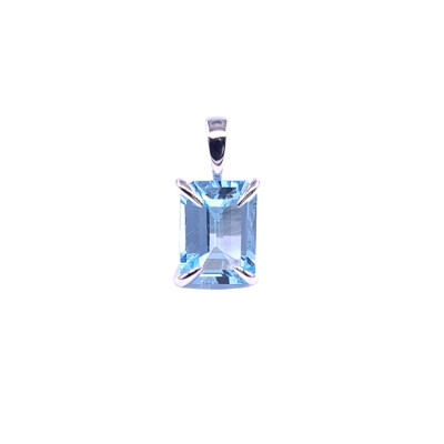 Pendentif en or blanc, et topaze bleue traitée
