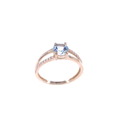 Bague en or jaune, topaze bleue traitée et oxydes de zirconium