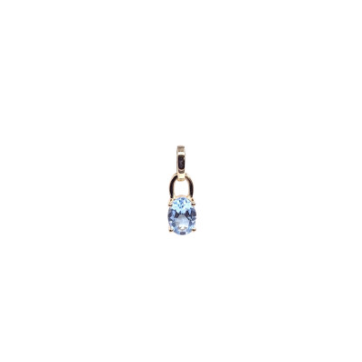 Pendentif en or jaune et topaze bleue traitée