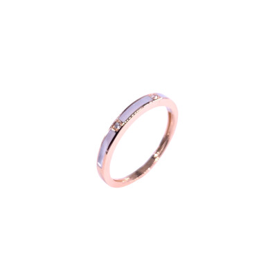 Bague en or rose, diamants et résine nacrée blanche