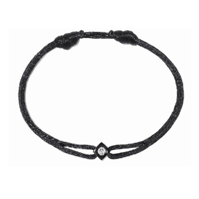 Un bracelet sur cordon dinh van Le Cube Diamant en titane et diamant blanc