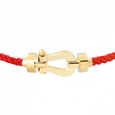 Bracelet FRED Force 10 moyen modèle manille en or jaune et câble en corderie rouge