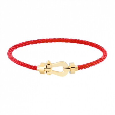 Bracelet FRED Force 10 moyen modèle manille en or jaune et câble en corderie rouge