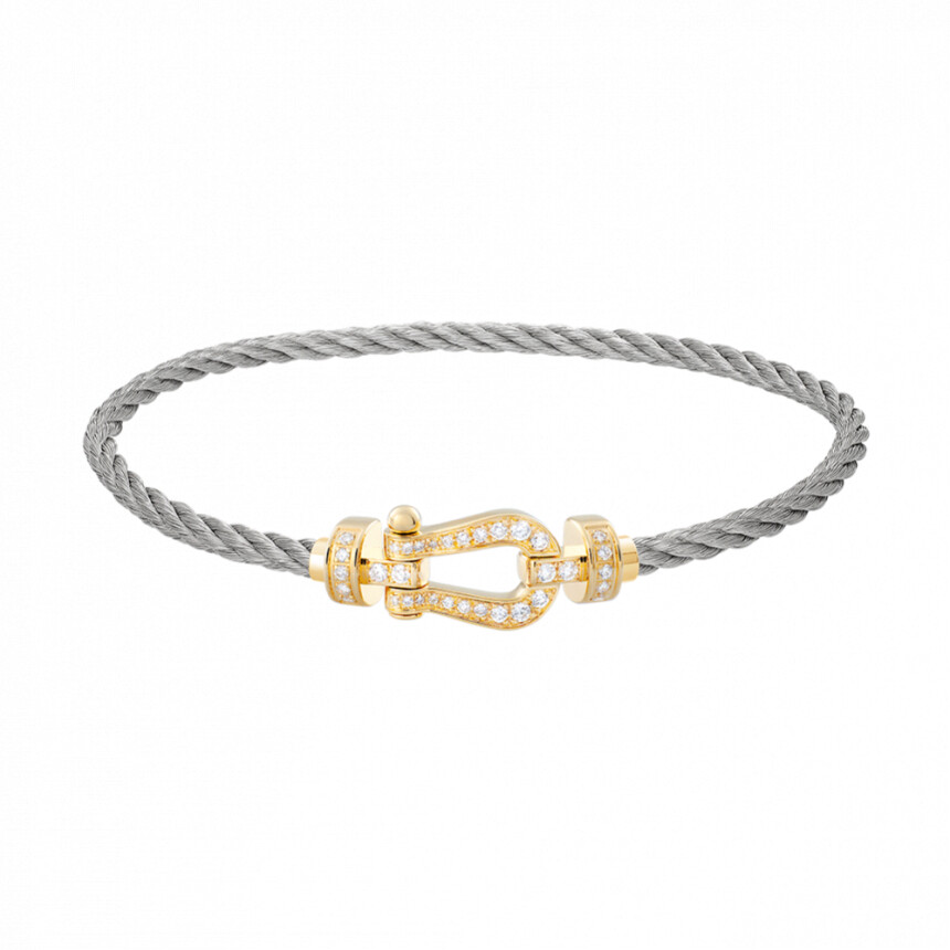 Bracelet FRED Force 10 moyen modèle manille en or jaune et diamants, câble en acier