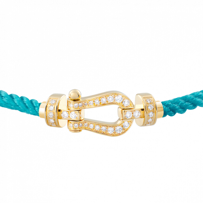 Bracelet FRED Force 10 moyen modèle manille en or jaune et diamants, câble en corderie turquoise