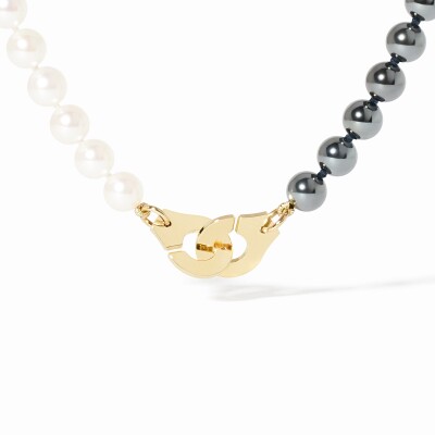 Collier dinh van Menottes Moyen Modèle en or jaune, perles d'eau douce et hématites