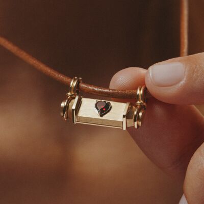 Marie Lichtenberg Smash Locket Heart Necklace in yellow gold and garnet on a 44cm leather cord