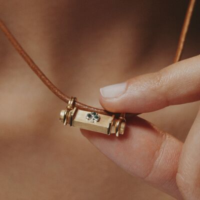 Marie Lichtenberg Smash Locket Clover Necklace in yellow gold and emerald on a 44cm micro lasso chain
