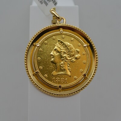 Pendentif Port pièce 10$